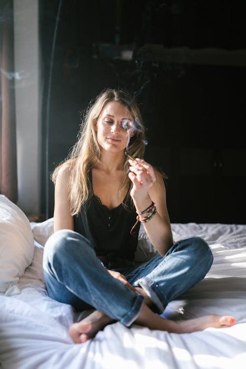 A woman smoking cannabis