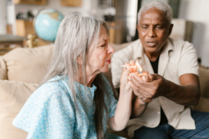 An image of a woman lighting up a joint