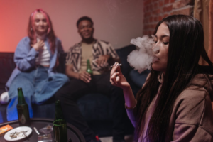 People drinking and smoking